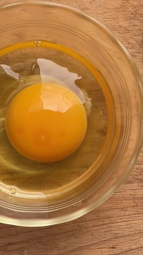 Raw egg from top Stock Footage 288255804