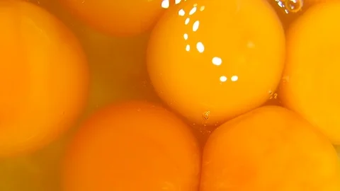 Raw eggs are an important ingredient in many kinds of cooking. Video stock 74200768