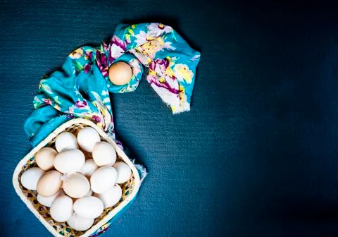 Raw eggs on the blue background Stock Photos