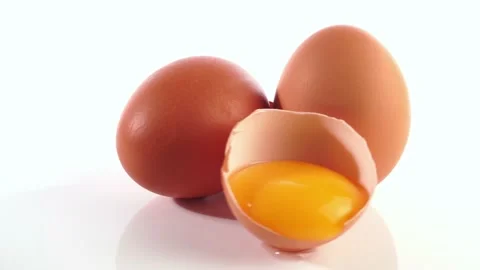 Raw Eggs with Egg Yolk in a Shell turn around animation - Chicken Eggs Stock Footage 172500000