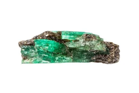 Raw emerald crystal isolated on white Stock Photos