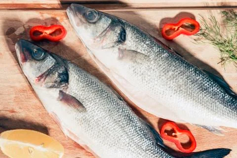Raw fish on a cutting Board Stock Photos