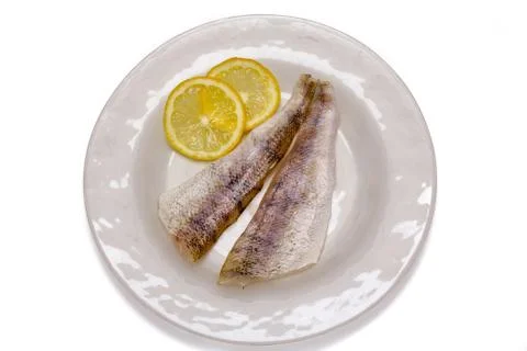 Raw fish filets with lemon Stock Photos