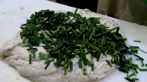 Raw fish paste on a white cutting board to prepare traditional Korean fish cakes Stock Footage 337374614