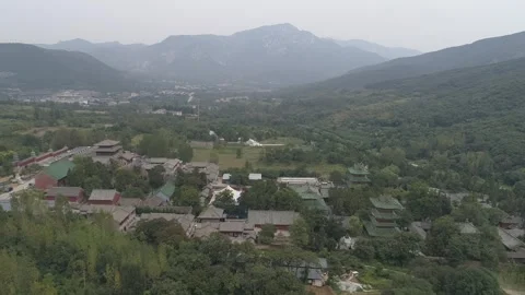 Raw footage of Aerial drone view of  Shaolin temple in Henan Province, Chin.. Video stock 346725688
