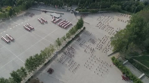 Raw footage of Aerial drone view of Shaolin temple training Martial arts in.. Video stock 346726112