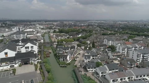 Raw footage of Aerial drone view of Suzhou city in China. Jinghang waterway.. Video stock 346726404