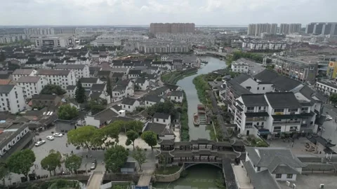 Raw footage of Aerial drone view of Suzhou city in China. Jinghang waterway.. Video stock 346726409