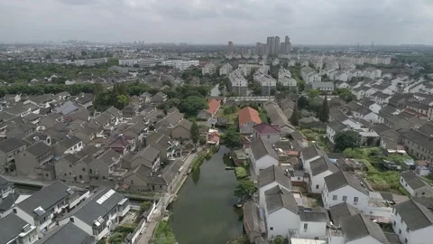 Raw footage of Aerial drone view of Suzhou city in China. Jinghang waterway.. Video stock 346726430