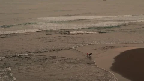 RAW FOOTAGE, WAVES, BEACH, SHOT FROM ABOVE, DRAMATIC LIGHT Stock Footage 273760067