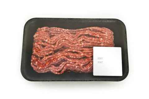 Raw forcemeat isolated on a white background in a package Stock Photos