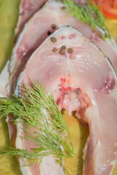 Raw fresh fish carp steaks with spices before cooking Stock Photos