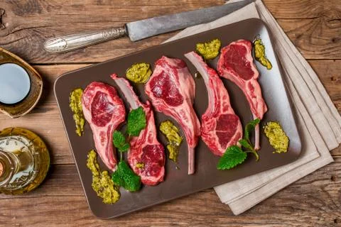 Raw fresh lamb ribs with sauce Stock Photos