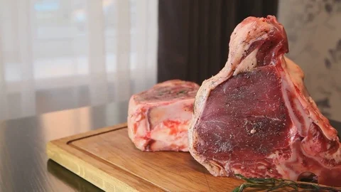 Raw fresh meat Ribeye Steak. Meat for steak. Raw meat. Video stock 82689802