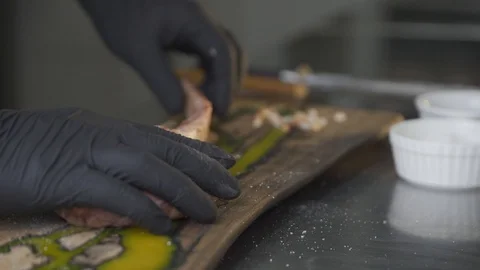 Raw fresh meat Tomahawk Steak and seasoning on a wooden desk. Chef and his Stock Footage 117441480