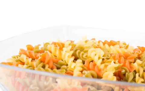 Raw fusilli pasta - three colors Stock Photos