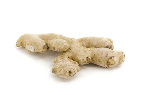 Raw ginger captured on bright white minimal lighting. Stock Photos
