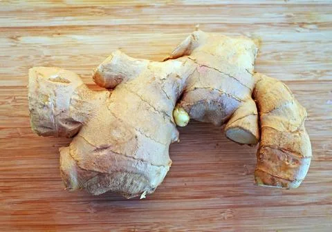 Raw Ginger root ready to use Stock Photos