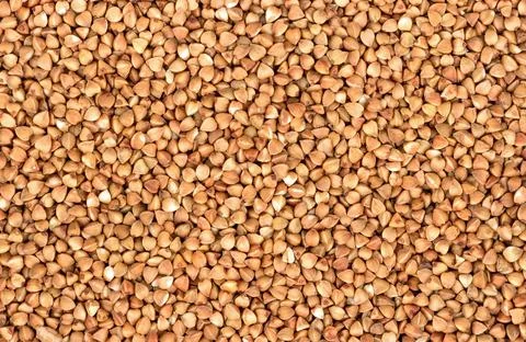 Raw grains of buckwheat Stock Photos