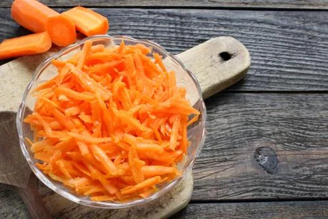 Raw grated carrots Stock Photos