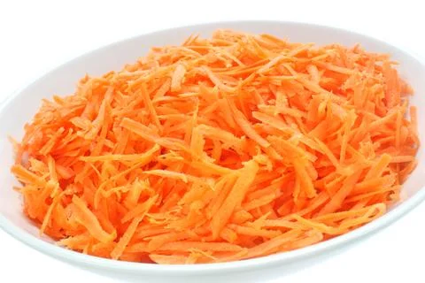 Raw grated carrots Stock Photos