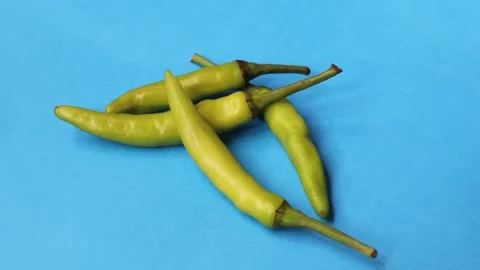 Raw green chili pepper circle rotation close up top view. Stock Footage 278343265