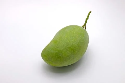 Raw Green Mango on White Background Photos