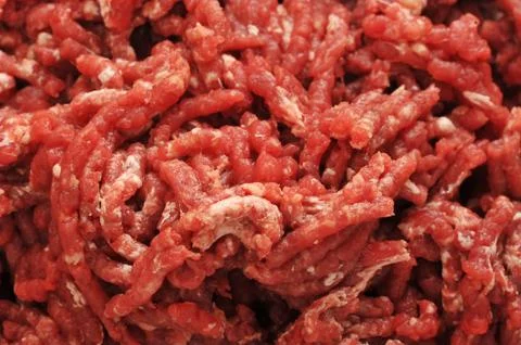 Raw ground beef. background from minced meat close-up Stock Photos