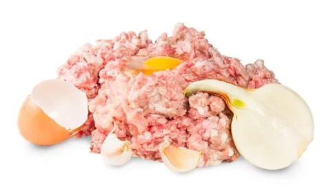 Raw ground beef with egg and garlic and onions Stock Photos