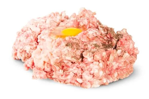 Raw ground beef with egg and black pepper Stock Photos