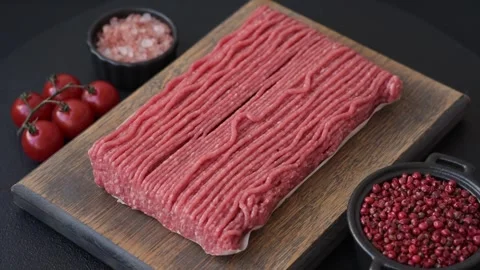 Raw ground beef or pork with salt, spices, herbs and tomatoes 動画素材 292662477