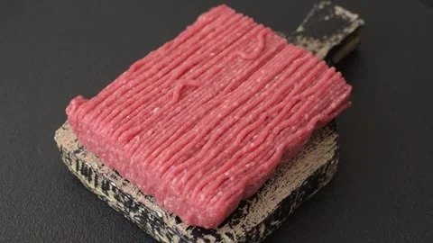 Raw ground beef or pork with salt, spices, herbs and tomatoes 動画素材 292662518
