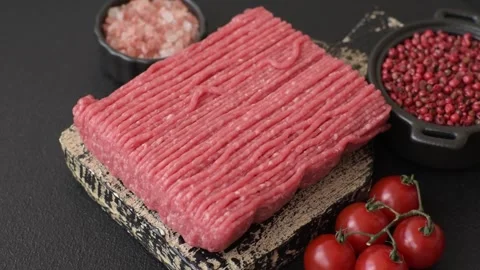 Raw ground beef or pork with salt, spices, herbs and tomatoes 動画素材 292662529