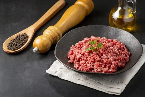 Raw ground beef ready for preparation. Stock Photos