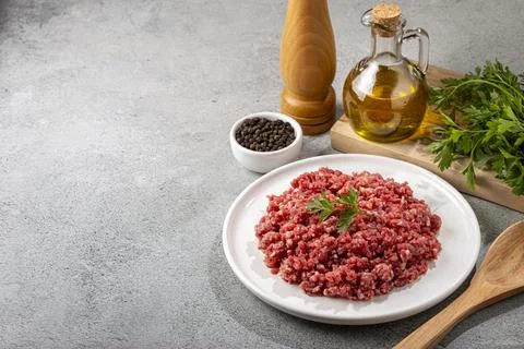 Raw ground beef ready for preparation. Stock Photos