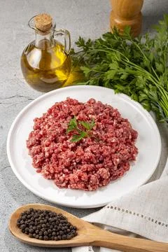 Raw ground beef ready for preparation. Stock Photos
