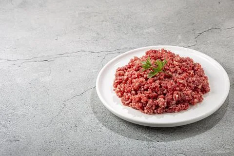 Raw ground beef ready for preparation. Stock Photos