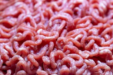 Raw ground beef texture for culinary use a fresh meat product in high detail Фото