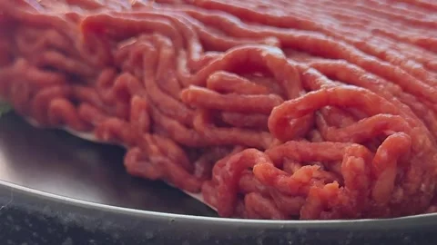 Raw ground meat beef or pork farm product healthy eating, nutritious dish Stock Footage 347317576