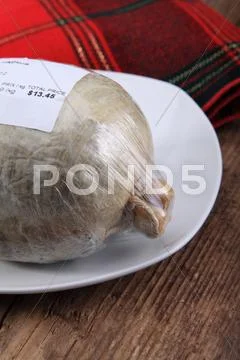Raw haggis Stock Photos