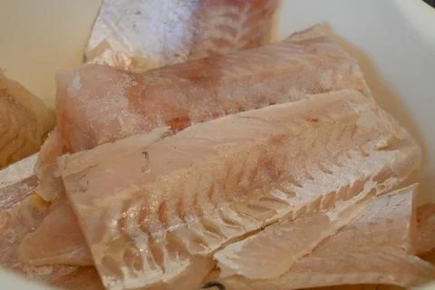 Raw hake fillet close up Stock Photos