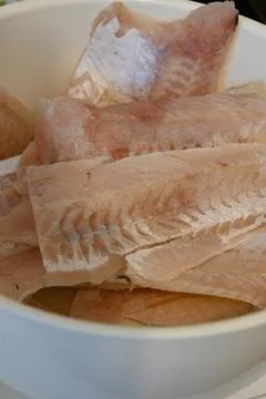 Raw hake fillet close-up Stockfoto's