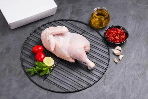 Raw half chicken with skin Stock Photos