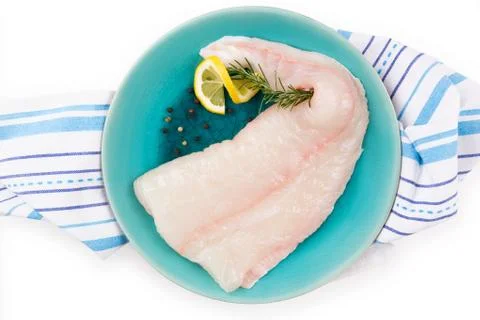 Raw halibut fillet. Stock Photos
