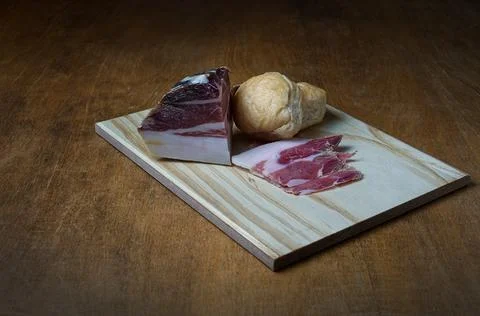 Raw ham sliced and bread Stock Photos