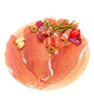 Raw ham on white background Stock Photos