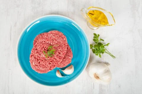 Raw hamburger Stock Photos