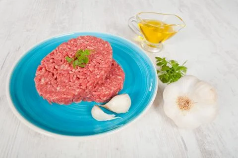 Raw hamburger Stock Photos