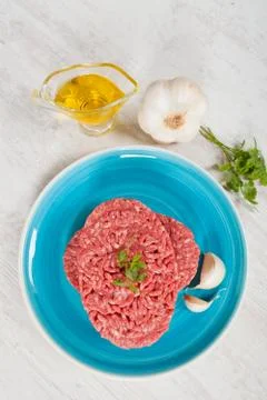 Raw hamburger Stock Photos