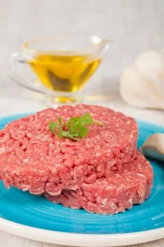 Raw hamburger Stock Photos